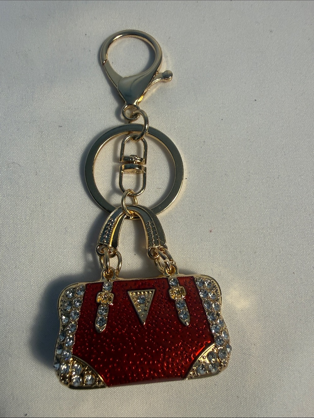 Gold-Tone Red Enamel Purse Keychain with Crystal Accents